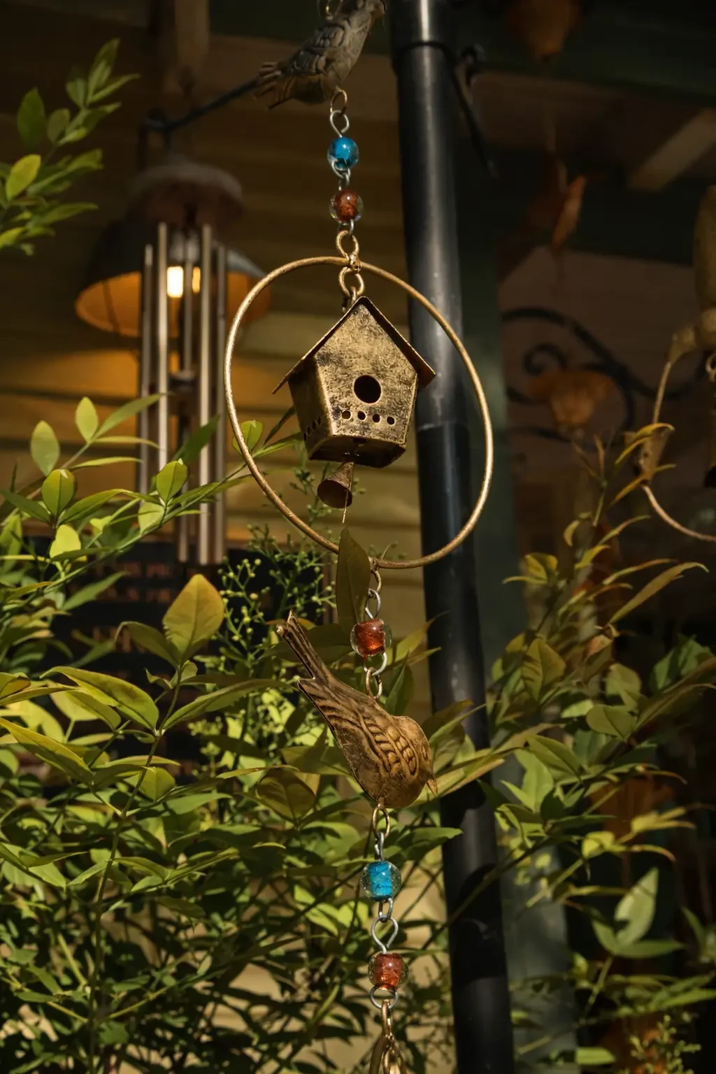 A decorative birdhouse in the garden